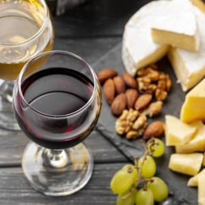 high-angle-tray-with-cheese-red-wine-variety-min_original